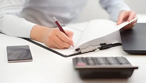 Bookkeeping and Payroll Services in Whistler BC, Squamish and Pemberton, Sea to Sky corridor and Vancouver 47 Woman doing finances