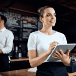 restaurant manager using tablet for bookkeeping tips for restaurants