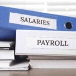 Year-End Payroll Checklist for BC Employers 2025 with salaries and payroll binders