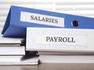 Year-End Payroll Checklist for BC Employers 2025 with salaries and payroll binders